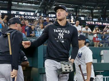 New York Yankees right fielder Aaron Judge (99) takes the field before a MLB game against...