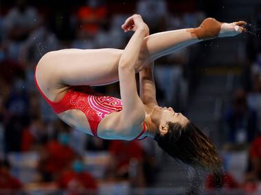 China’s Shi Tingmao dives in the women’s 3 meter springboard final during the postponed 2020...