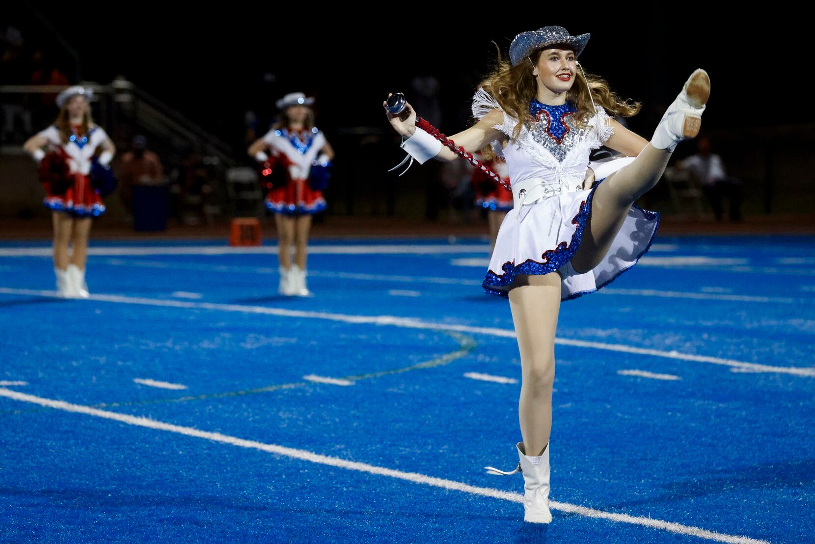 Parish Episcopal School Rosette Lieutenant Abby Knize performs during the halftime of a...