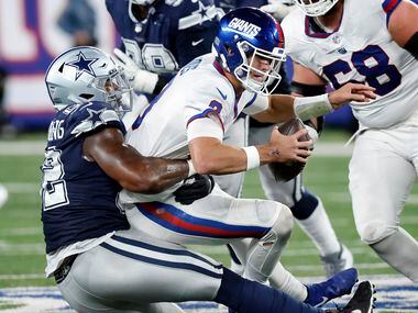 Dallas Cowboys defensive end Dorance Armstrong (92) sacks New York Giants quarterback Daniel...