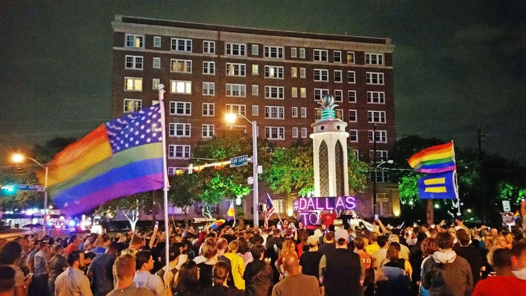 North Texas' LGBT community rallies in front of the Legacy of Love Monument in Oak Lawn, Dallas, on June 13, 2016. The rally was held to protest a mass shooting at Pulse Night Club in Orlando, Fla., the previous day.