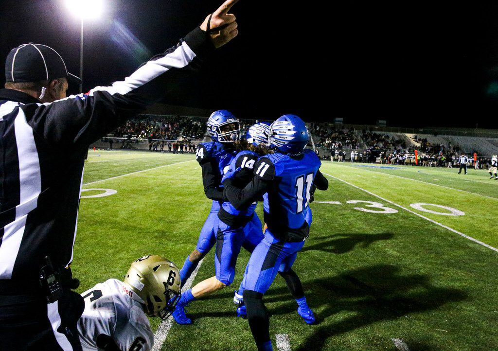 North Forney defensive back Jacob Donaldson (14) celebrate with his tam after intercepting a...