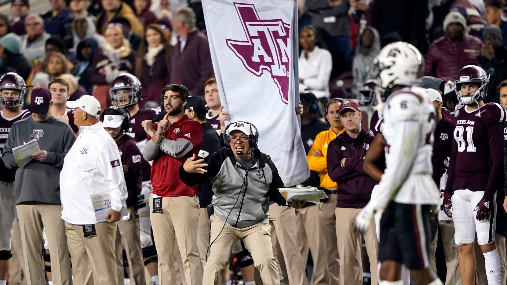 Texas A&M coach Jimbo Fisher yells to his players during the second half of an NCAA college...