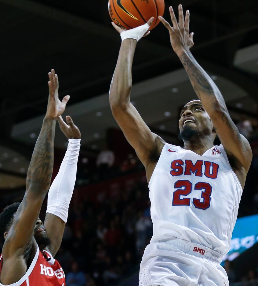 Southern Methodist Mustangs guard Michael Weathers (23) shoots the ball while Houston...