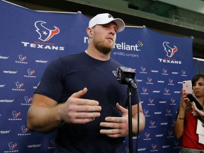 J.J. Watt answers questions during a press conference after practice at The Star in Frisco...
