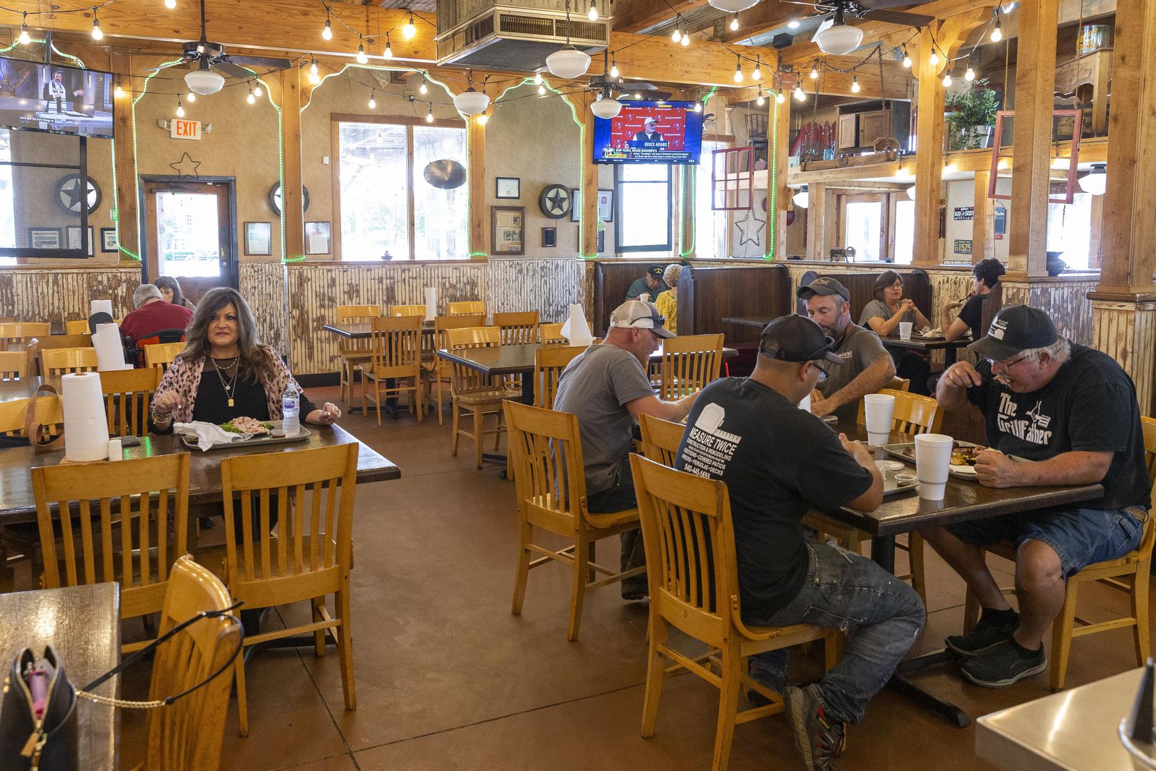 Customers eat during the lunch hour at Baker's Ribs in Weatherford.