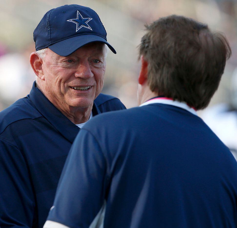 Dallas Cowboys owner Jerry Jones, left talks with Arlington Mayor Jeff Williams after the...