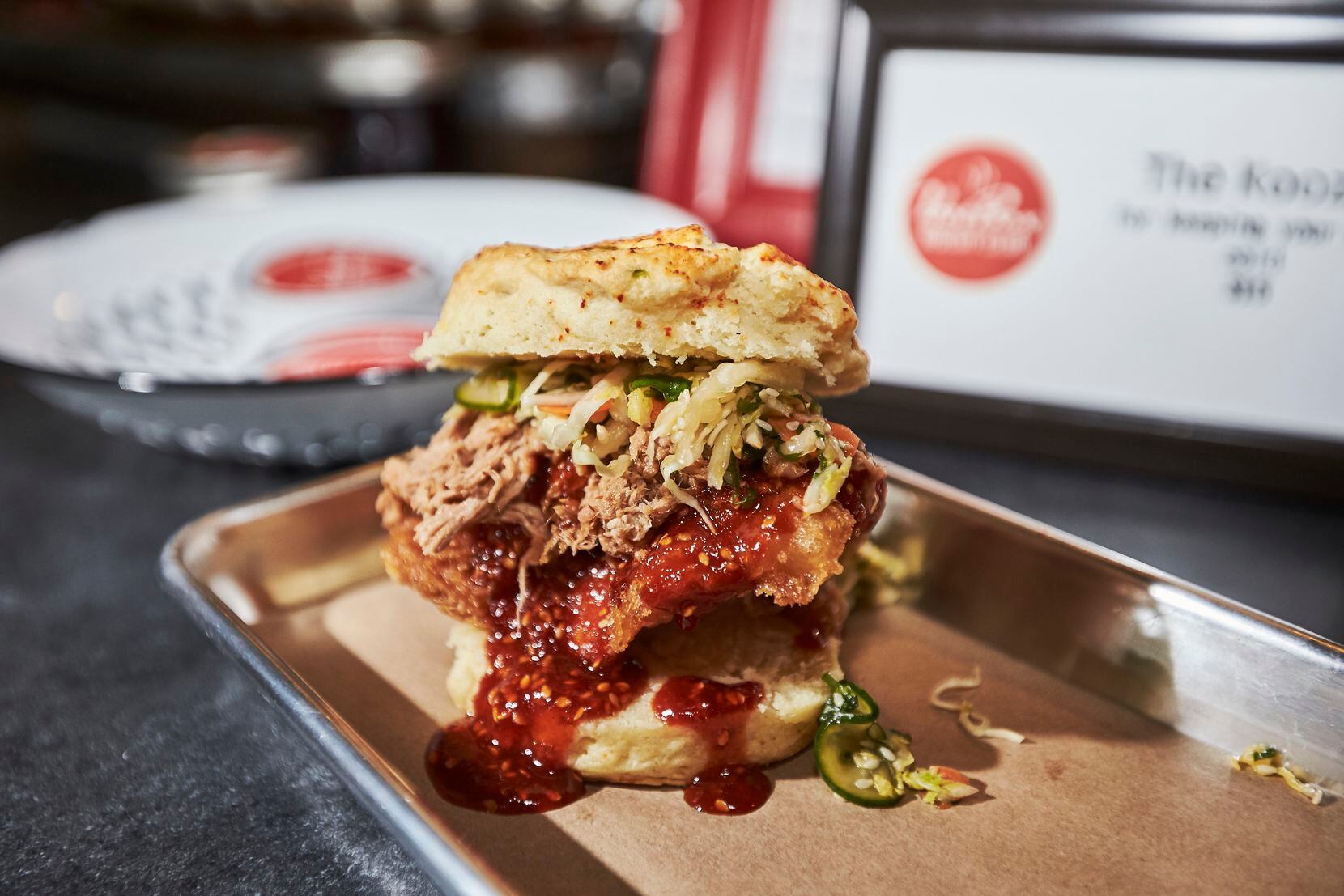 "Hot Box in Tokyo," includes fried chicken, gochujang glaze, pulled pork and Asian slaw, during a pop-up brunch held by Hot Box Biscuits Club at Tokyo Cafe.
