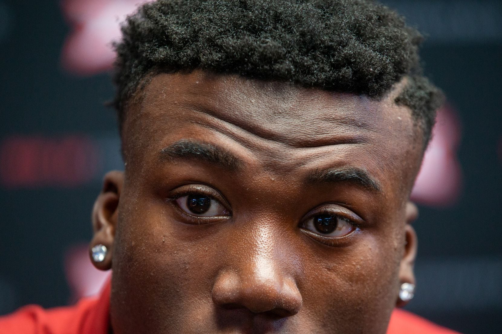 University of Oklahoma linebacker Kenneth Murray donned a pair of earrings and a Cuban link...