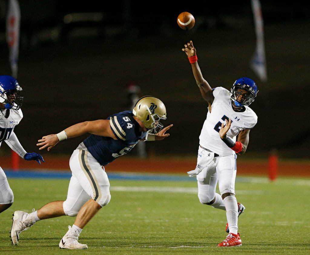 Trinity Christian's Shedeur Sanders (2) passes the ball as Austin Regents Benjamin Schultz (54) closes in on him during the first half of play at the TAPPS Division II State Championship game at Waco Midway's Panther Stadium in Hewitt, Texas on Friday, December 6, 2019. (Vernon Bryant/The Dallas Morning News)
