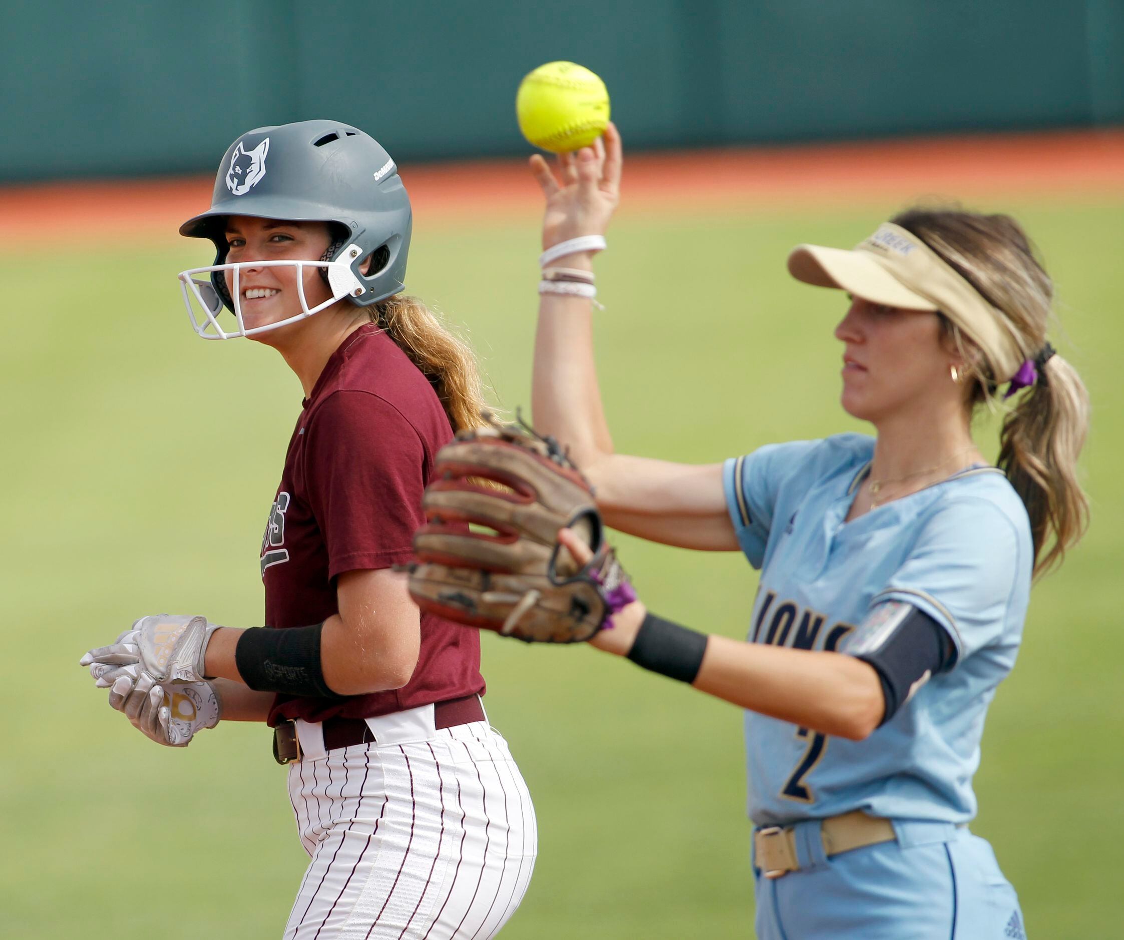 Frisco Heritage shortstop Ahna Van Meter (5) sports a smile after reaching second base...