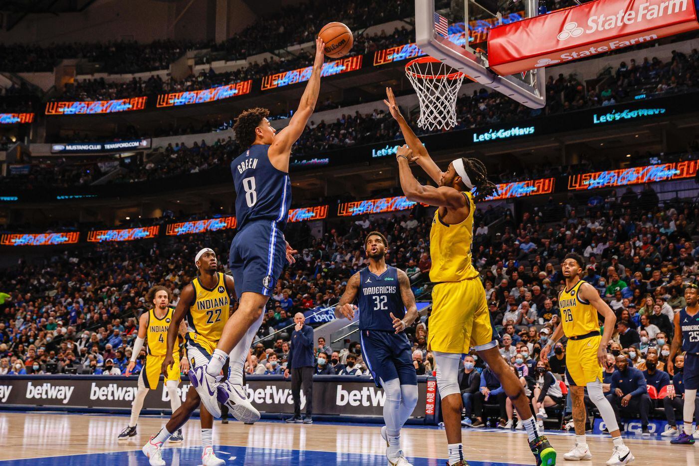 Dallas Mavericks forward George King (8) goes for a shot as Indiana Pacers forward Isaiah Jackson (23) tries to block him during the second half at the American Airlines Center in Dallas on Saturday, January 29, 2022.