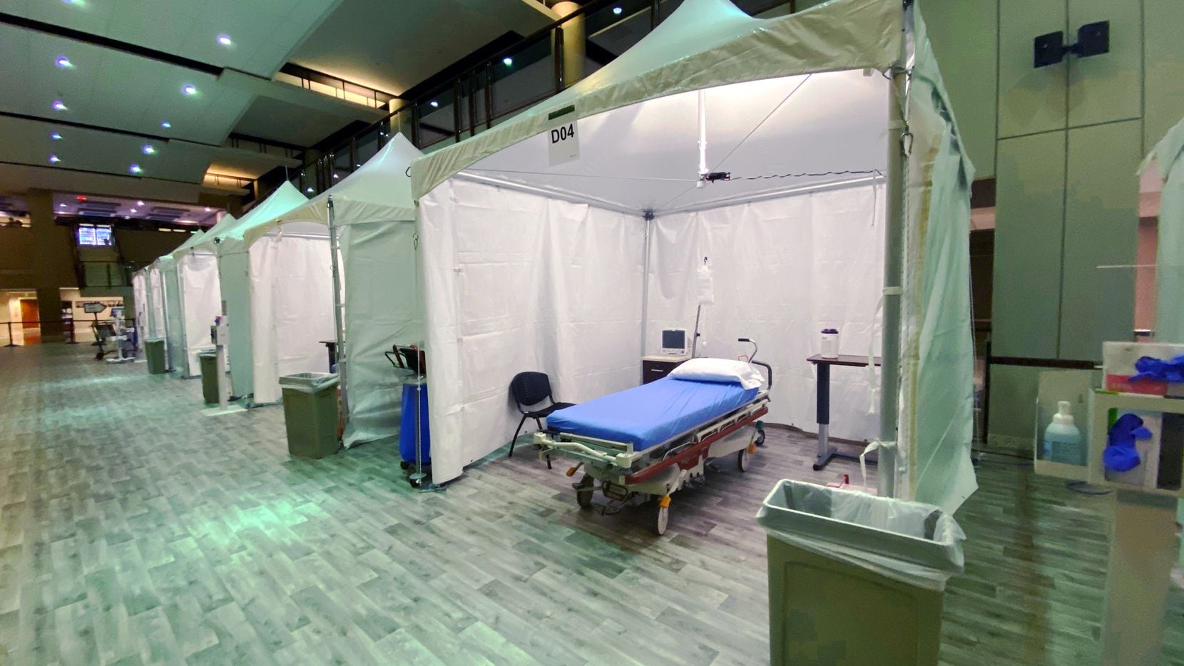Texas Health Plano has set up emergency tents in its lobby to help treat patients amid an...