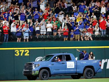 With his kids in the back of a pickup truck, former Texas Rangers third baseman Adrian...