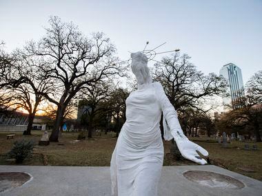 A statue erected without city permission was spotted Monday on the site of the former Confederate monument in Pioneer Park in downtown Dallas.