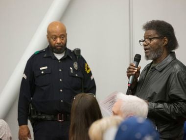 Former NAACP Dallas chapter president Arthur Fleming addresses the crowd during a town hall...
