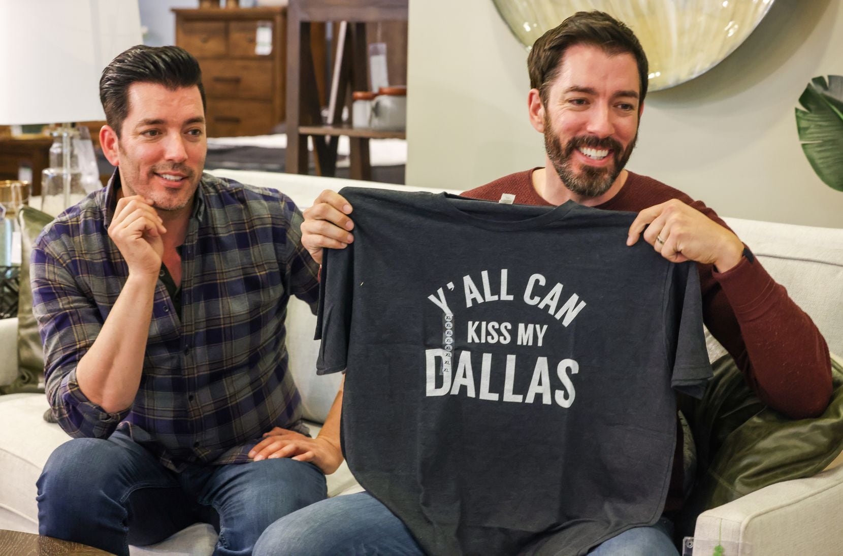 Jonathan (left) and Drew Scott received a shirt that shows the spirit of their Texas viewers...