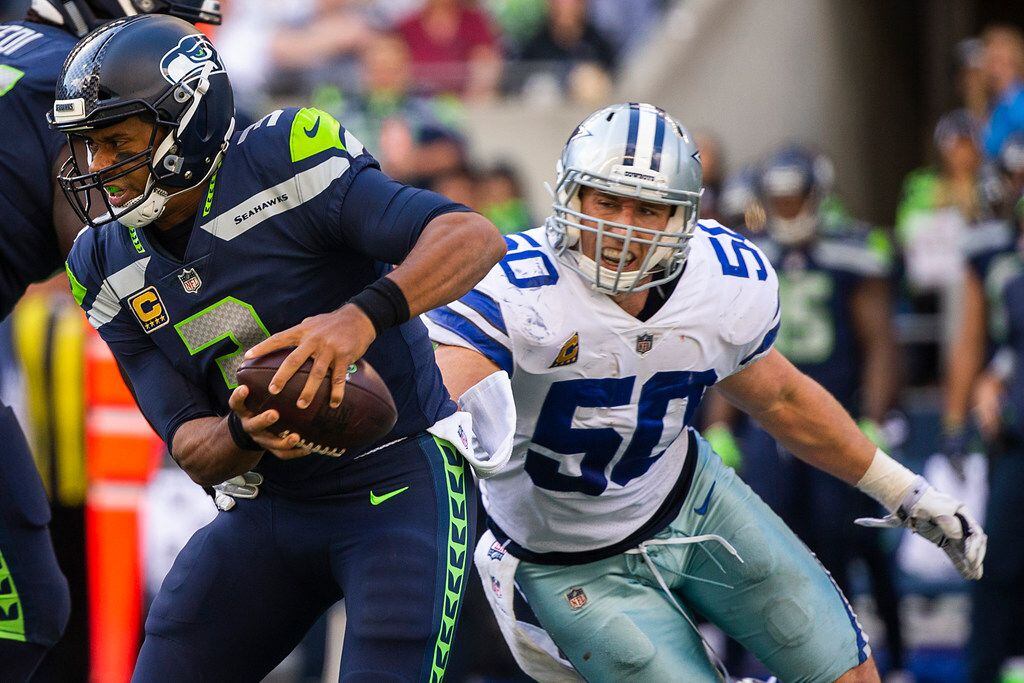 Seattle Seahawks quarterback Russell Wilson (3) is sacked by Dallas Cowboys linebacker Sean...