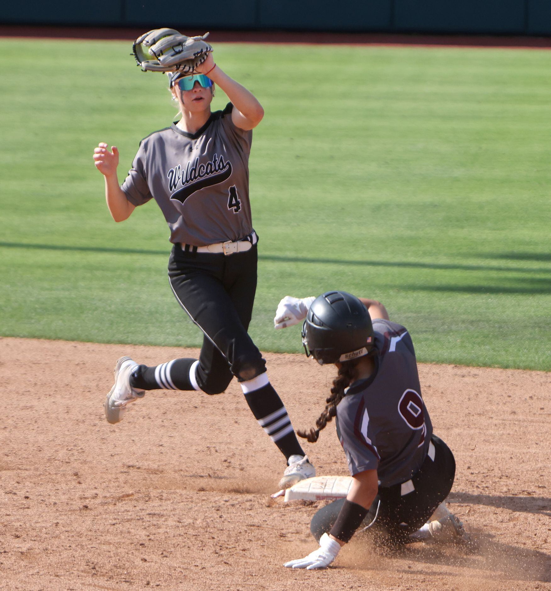 Denton Guyer shortstop Erin Peterson (4) forces Pearland baserunner Kailey Monsef (9) at...