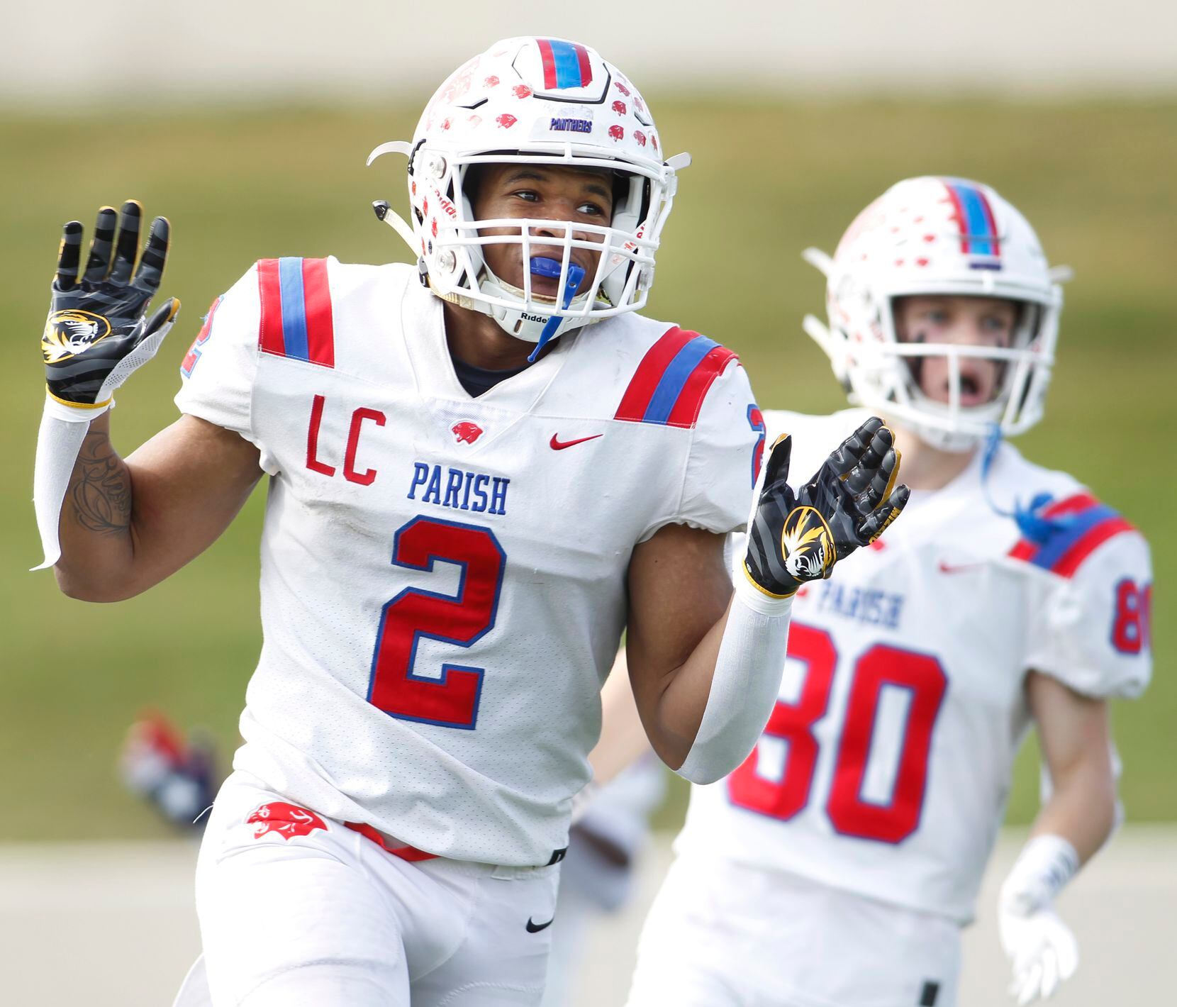 Parish Episcopal running back Andrew Paul (2) celebrates after scoring one of his three first half rushing touchdowns against Midland Christian. The two teams played their TAPPS Division 1 state championship football game at Waco ISD Stadium in Waco on December 4, 2021. (Steve Hamm/ Special Contributor)