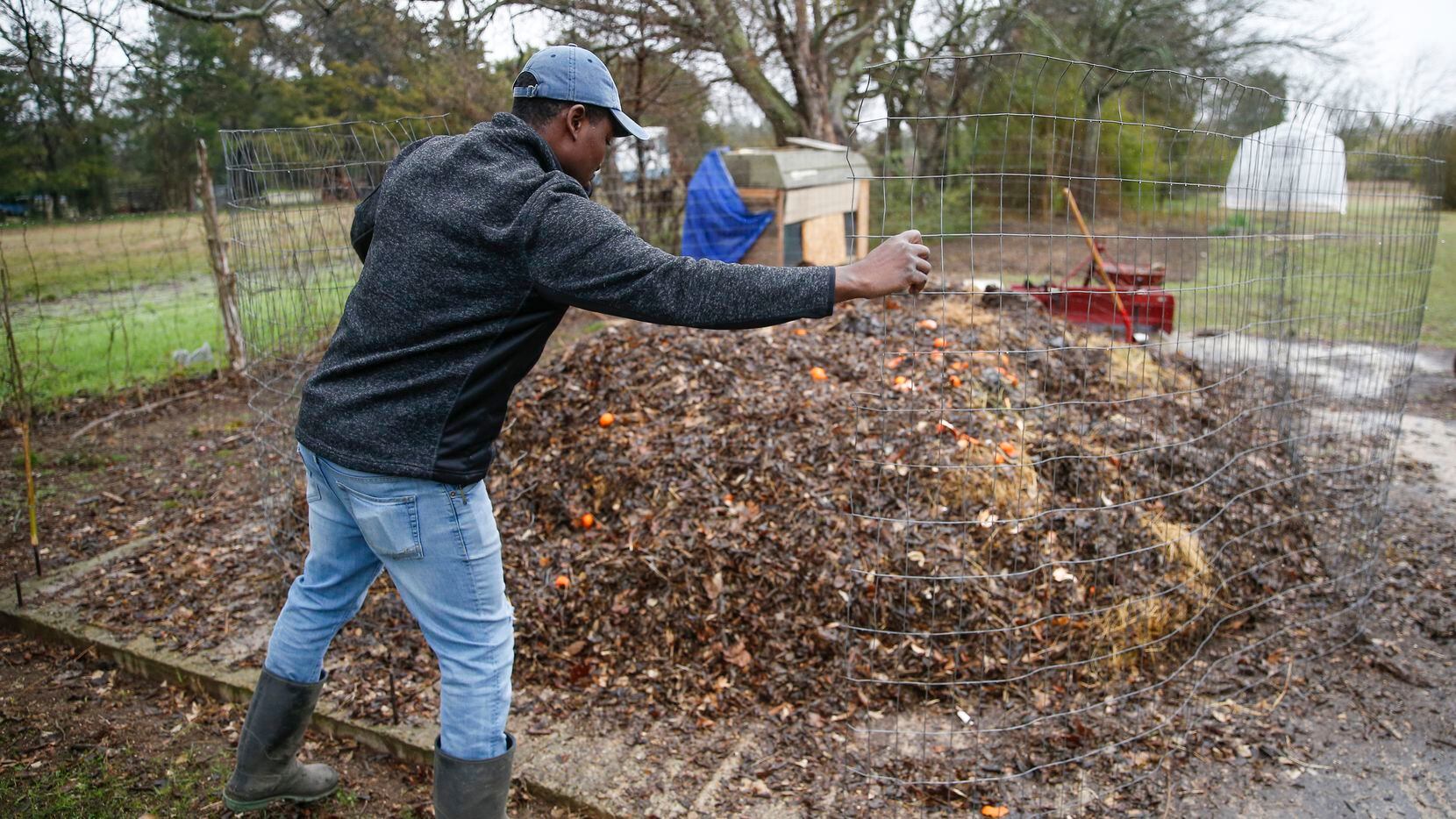 Kendall Rogers checks on a compost heap at Urban Dallas Farm on Wednesday, Jan. 22, 2020 in...