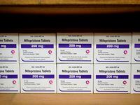 FILE - Boxes of the drug mifepristone line a shelf at the West Alabama Women's Center in...