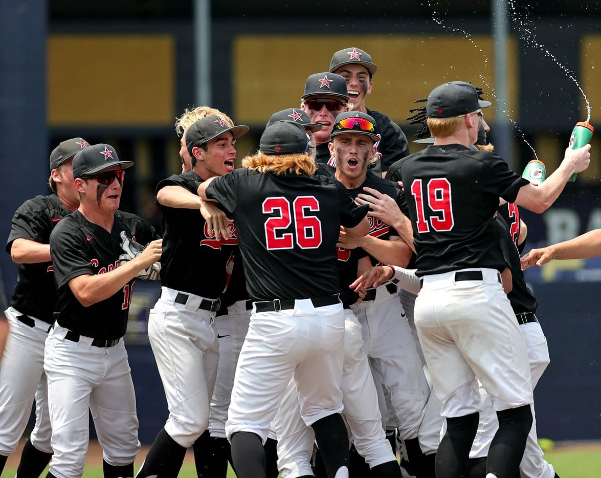 The Coppell Cowboys celebrate their victory over Prosper, 3-2 in game 3 of the 6A Region I...
