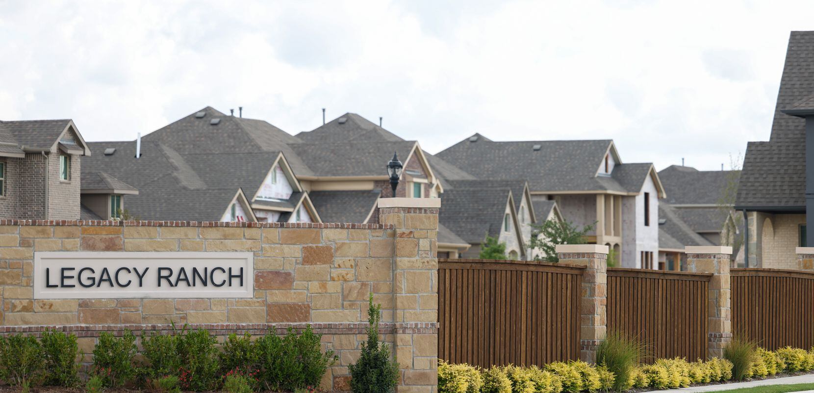 The entrance to the Legacy Ranch housing development is marked with a sign off of North...