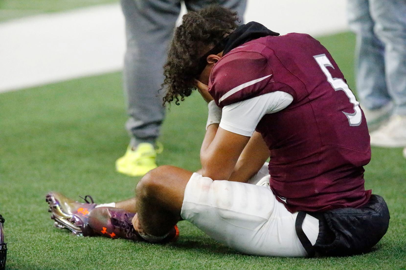 Mansfield Timberview High School quarterback Jaeden Marshall (5) reacts to having to sit out the final drive due to injury and losing the game to Lovejoy High School in a Class 5A Division II Region II semifinal football game at The Ford Center in Frisco on Friday night, November 21, 2021. (Stewart F. House/Special Contributor)