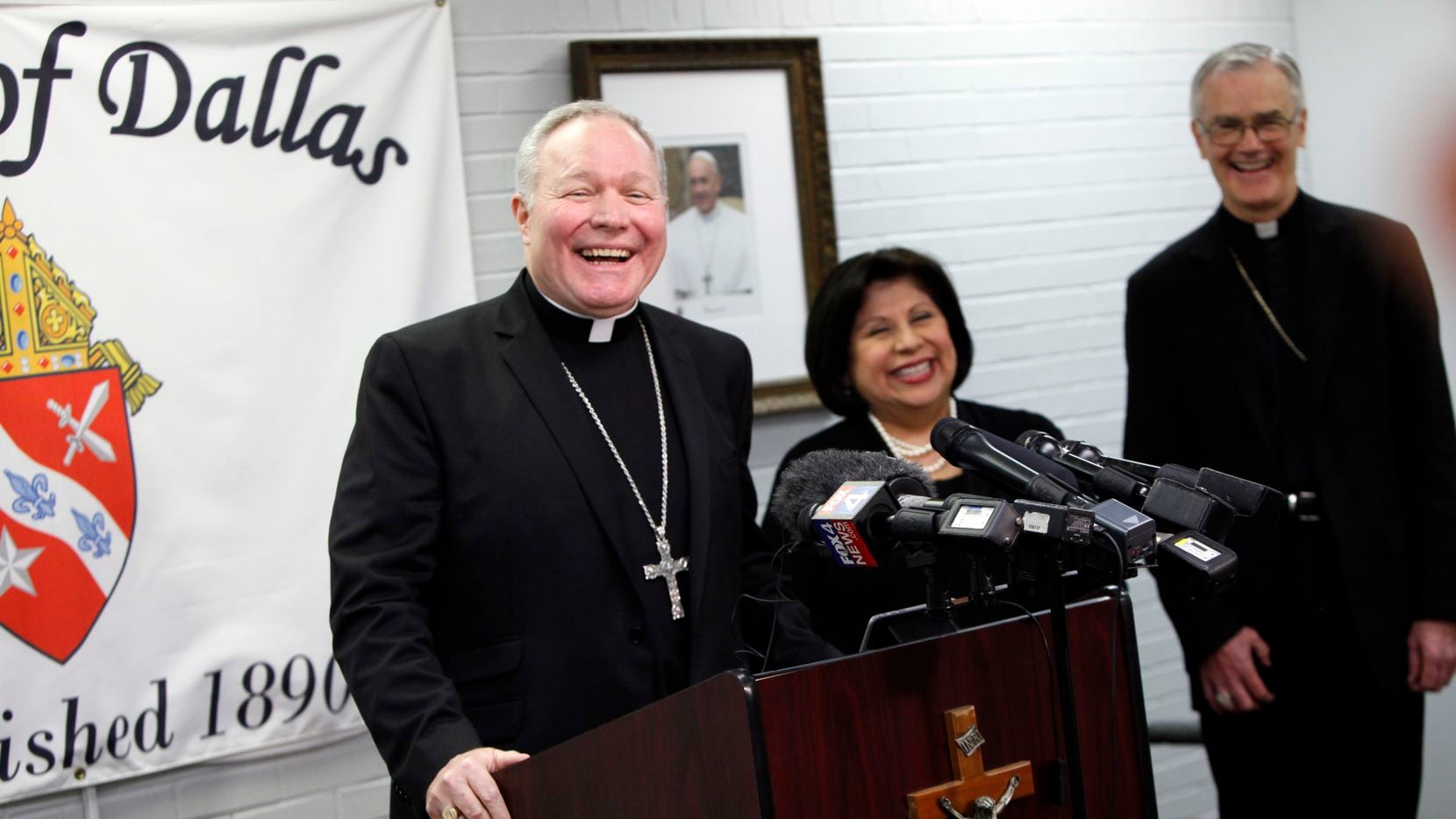 The Most Reverend Edward J. Burns speaks during a press conference as he's introduced as the...