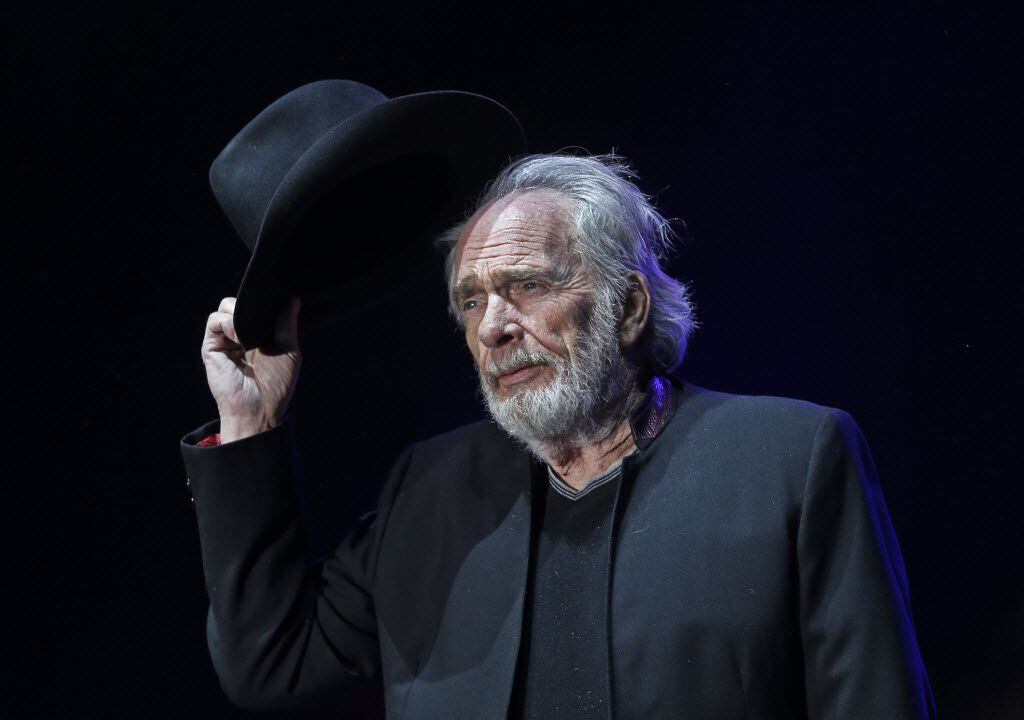 Merle Haggard tips his hat to the crowd as he begins to perform on the Palomino Stage on the...