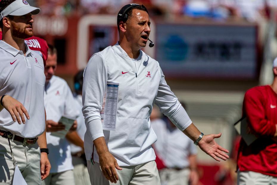 Alabama offensive Coordinator Steve Sarkisian yells to his players during the first half of...