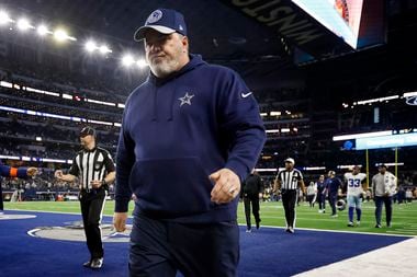 Dallas Cowboys head coach Mike McCarthy leaves the field following their Wild Card Playoff...