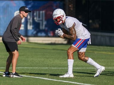 Southern Methodist University wide receiver Beau Corrales runs through a drill during...