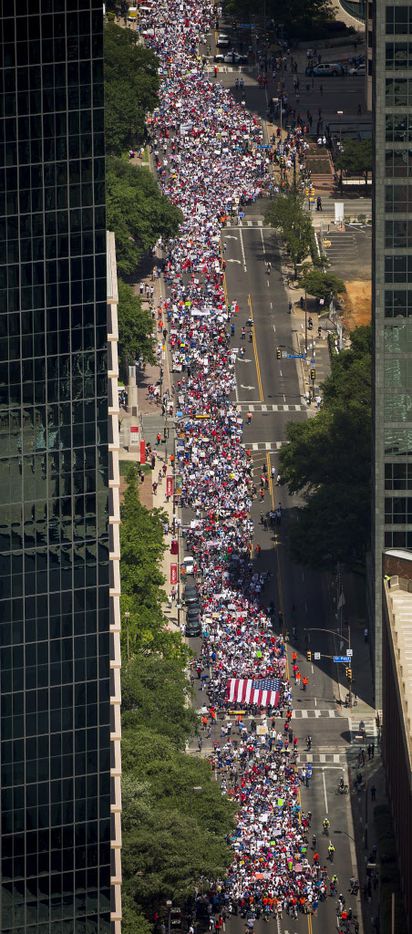 Demonstrators fill Ross Avenue during the 2017 Dallas Mega March on Sunday, April 9, 2017. Thousands of people marched through downtown Sunday afternoon to support immigrants' rights.