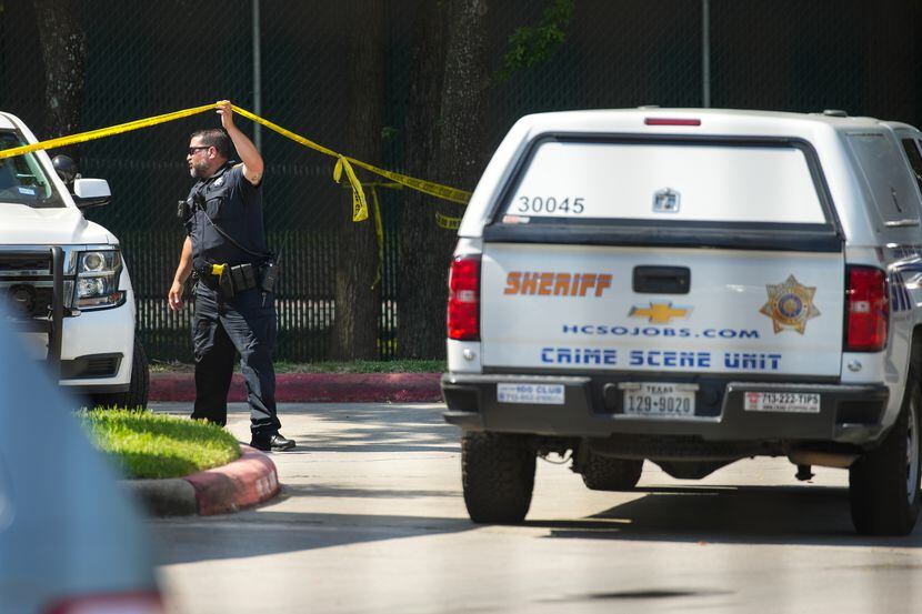 Sheriff’s officers investigate the scene of a shooting where, Sheriff Ed Gonzalez tweeted...