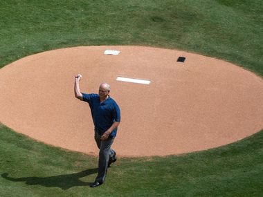 Texas Rangers legend Nolan Ryan pitches the final first pitch for the Rangers' final game...