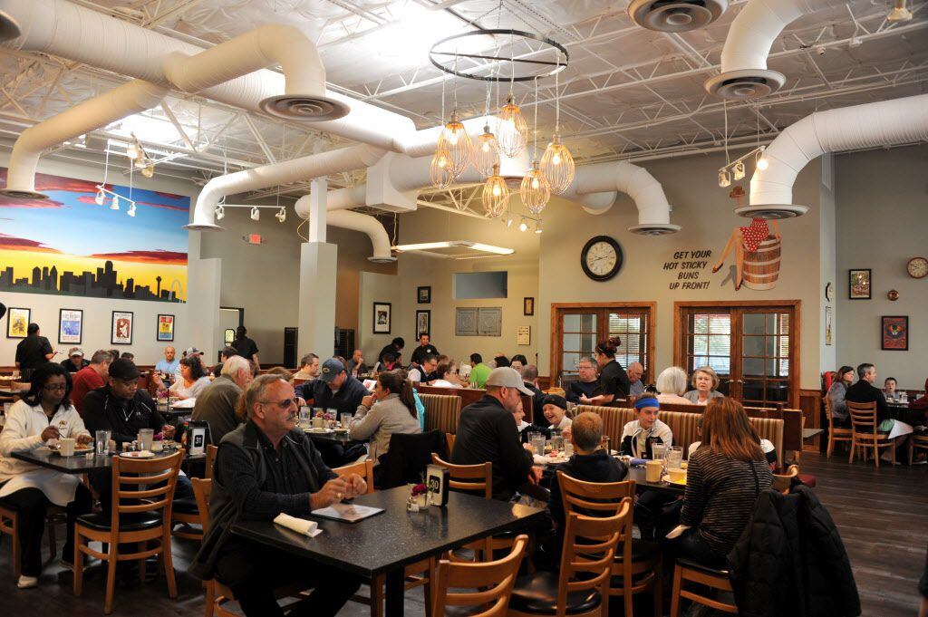Families and friends gather for a home-style breakfast at Crossroads Diner in Dallas, TX on...