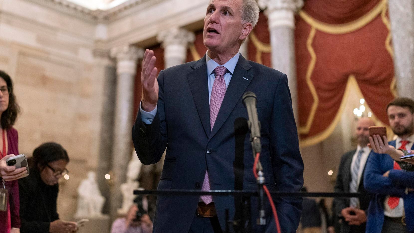 Newly-elected Speaker of the House Kevin McCarthy, R-Calif., talks to reporters after a...
