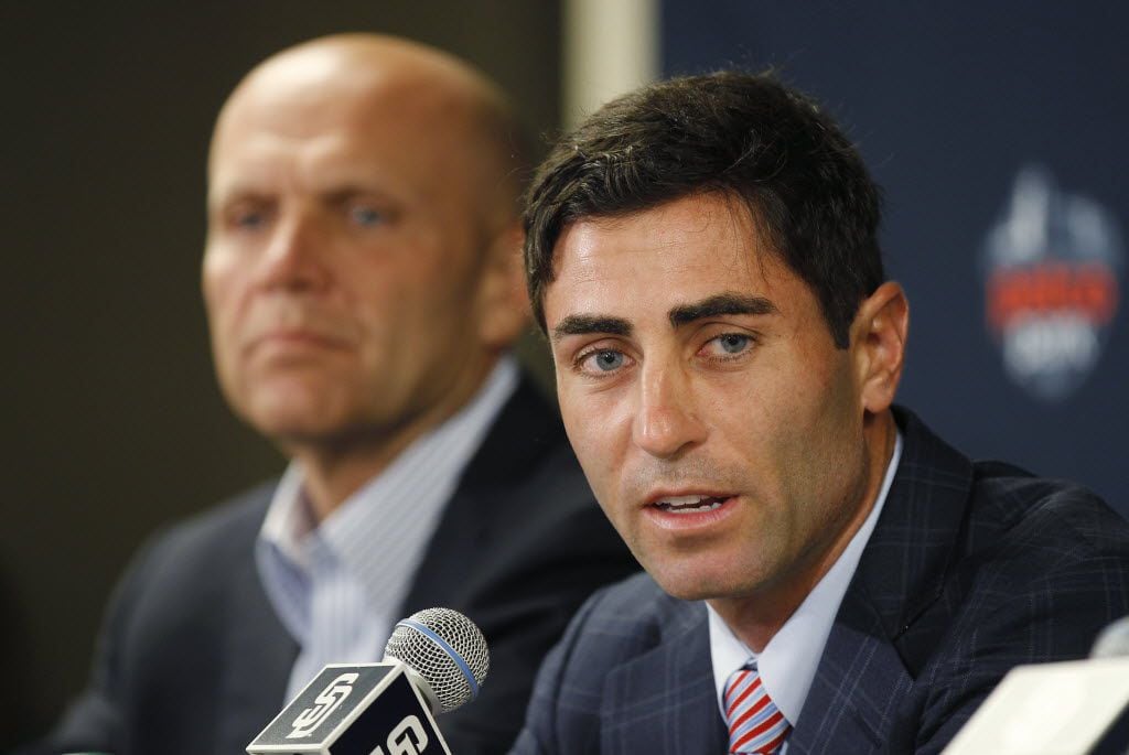 A.J. Preller, right, talks to reporters after being hired as general manager of the San...