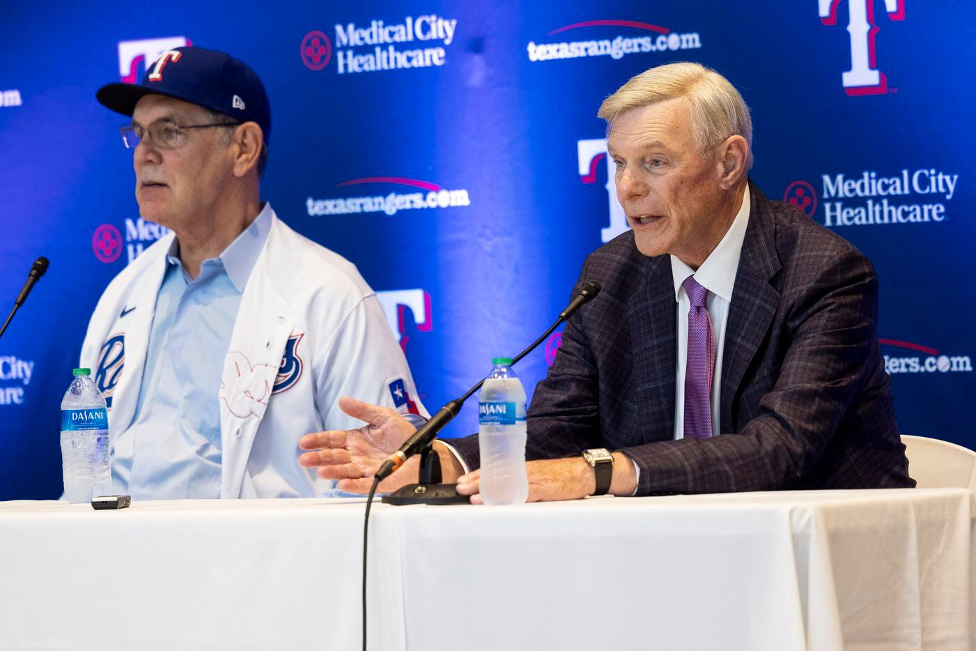 Texas Rangers owner Ray Davis (right) speaks at a press conference introducing new Texas...
