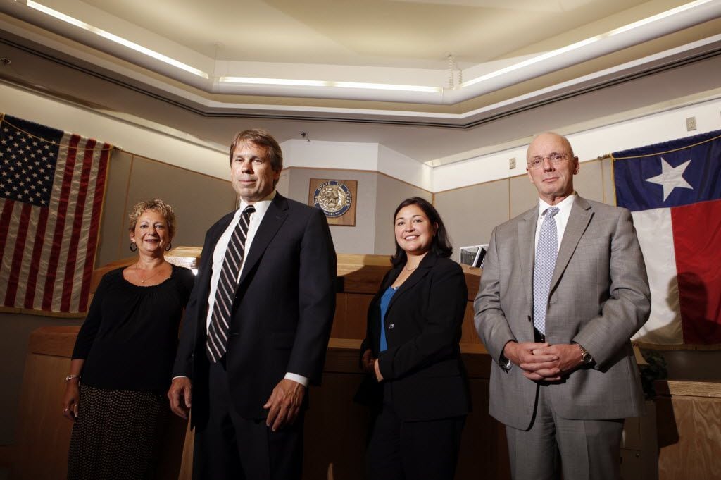 From left to right, members of the first Dallas County conviction integrity unit, paralegal...