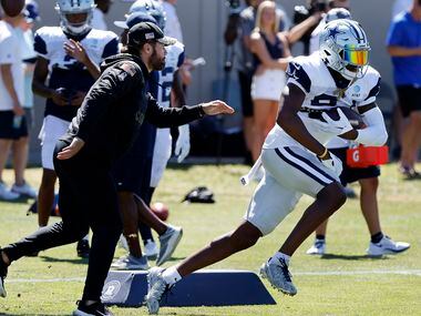 Dallas Cowboys safety Israel Mukuamu (24) runs through drill prior to a joint practice with...
