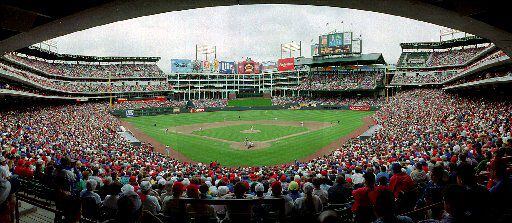 THE BALLPARK IN ARLINGTON - OPENING DAY - APRIL 11, 1994 - TEXAS RANGERS V. MILWAUKEE BREWERS // Shot April 11, 1994 -  ORG XMIT:  Texas Ranger fans fill The  Ballpark in Arlington for the home opener against Milwaukee. The Rangers were defeated 4-3. Photo taken with a panoramic camera. // jbrangers94 // trmb1994 ballparkhogue
