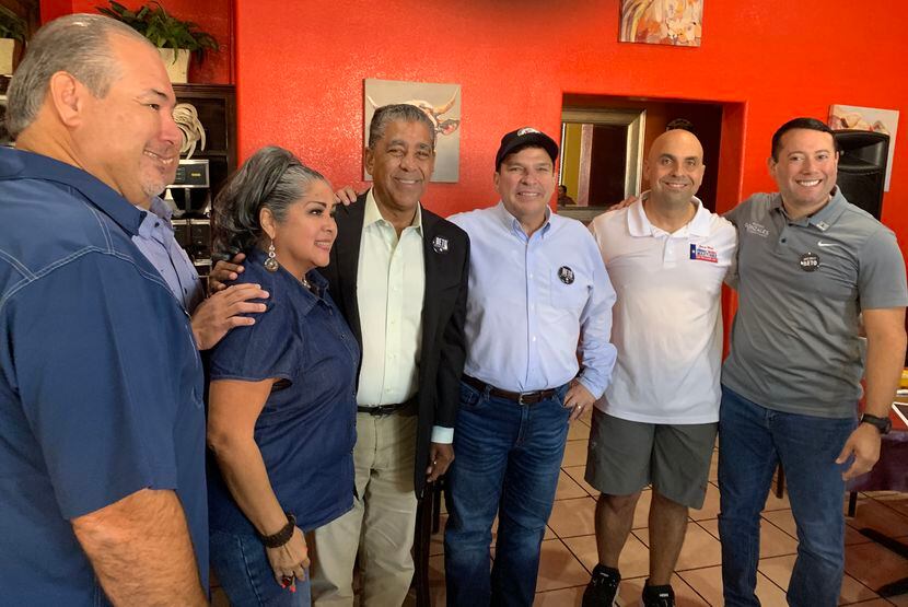 Rep. Vicente Gonzalez (third from right wearing cap) mingles with Democrats at El Dorado...