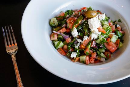 Shepherd salad at The Mayor's House by Selda is made with tomato, cucumber, feta, onion,...