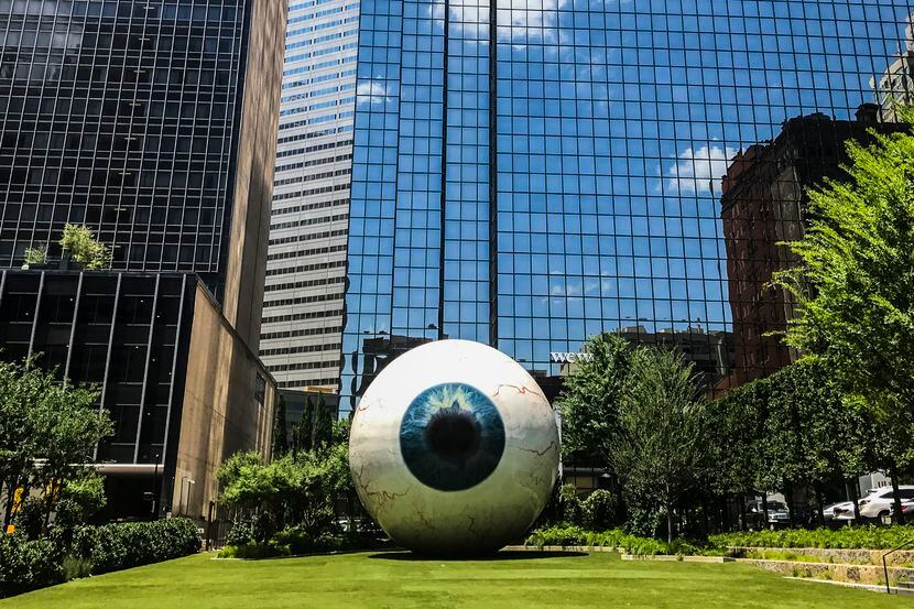 The 30-foot eyeball sculpture by Tony Tasset sits outside of the Joule Hotel in downtown...