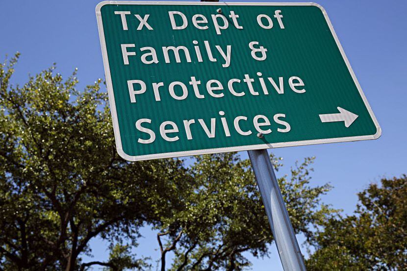 A sign outside of the Texas Department of Family and Protective Services office photographed...