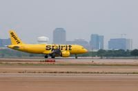 A Spirit Airlines flight arrives on Tuesday, May 9, 2023 at DFW Airport. 