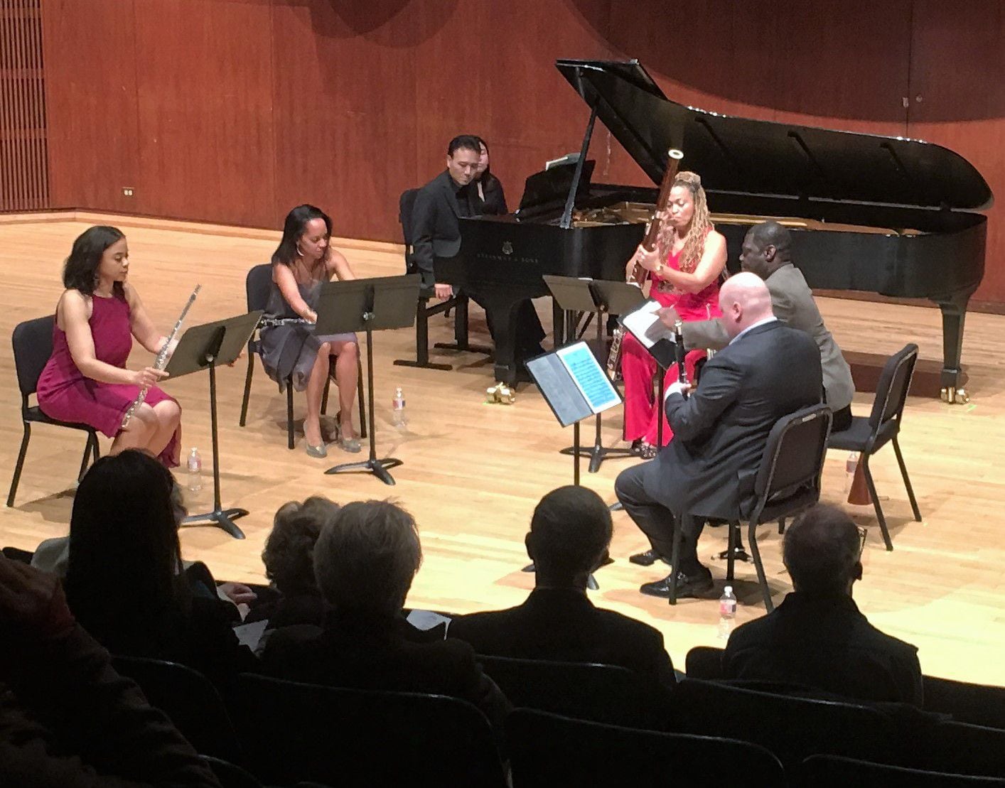 Pianist Jon Nakamatsu and the Imani Winds--L to R, Julietta Curenton (flute), Toyin-Spellman-Diaz (oboe), Monica Ellis (bassoon), Mark Dover (clarinet) and Jeff Scott (horn)--prepare to play the Poulenc Sextet for piano winds on Jan. 29, 2018 at Caruth Auditorium, Southern Methodist University 